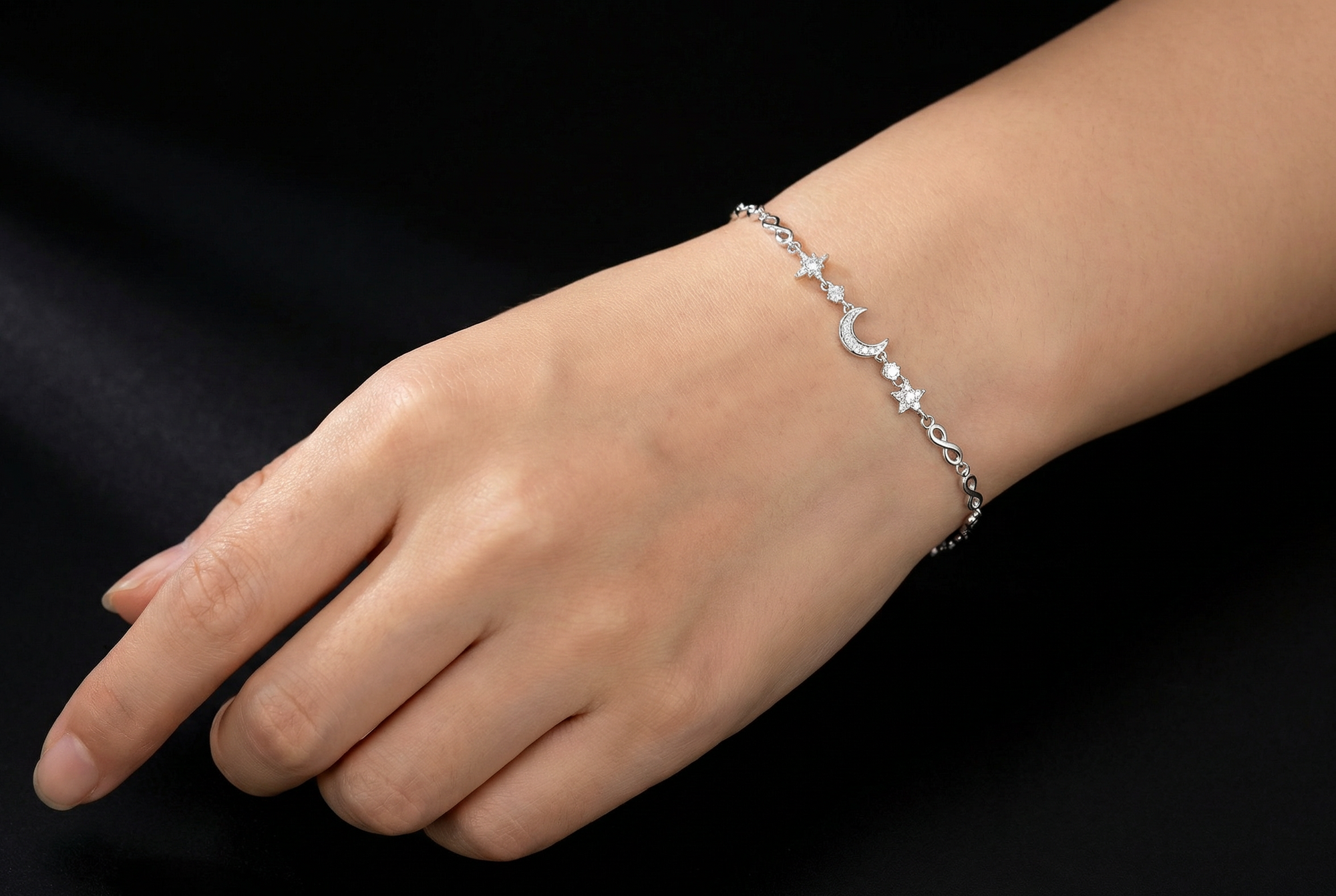 Celestial Charm Bracelet Featuring Moon and Star TISA Silver Elegance