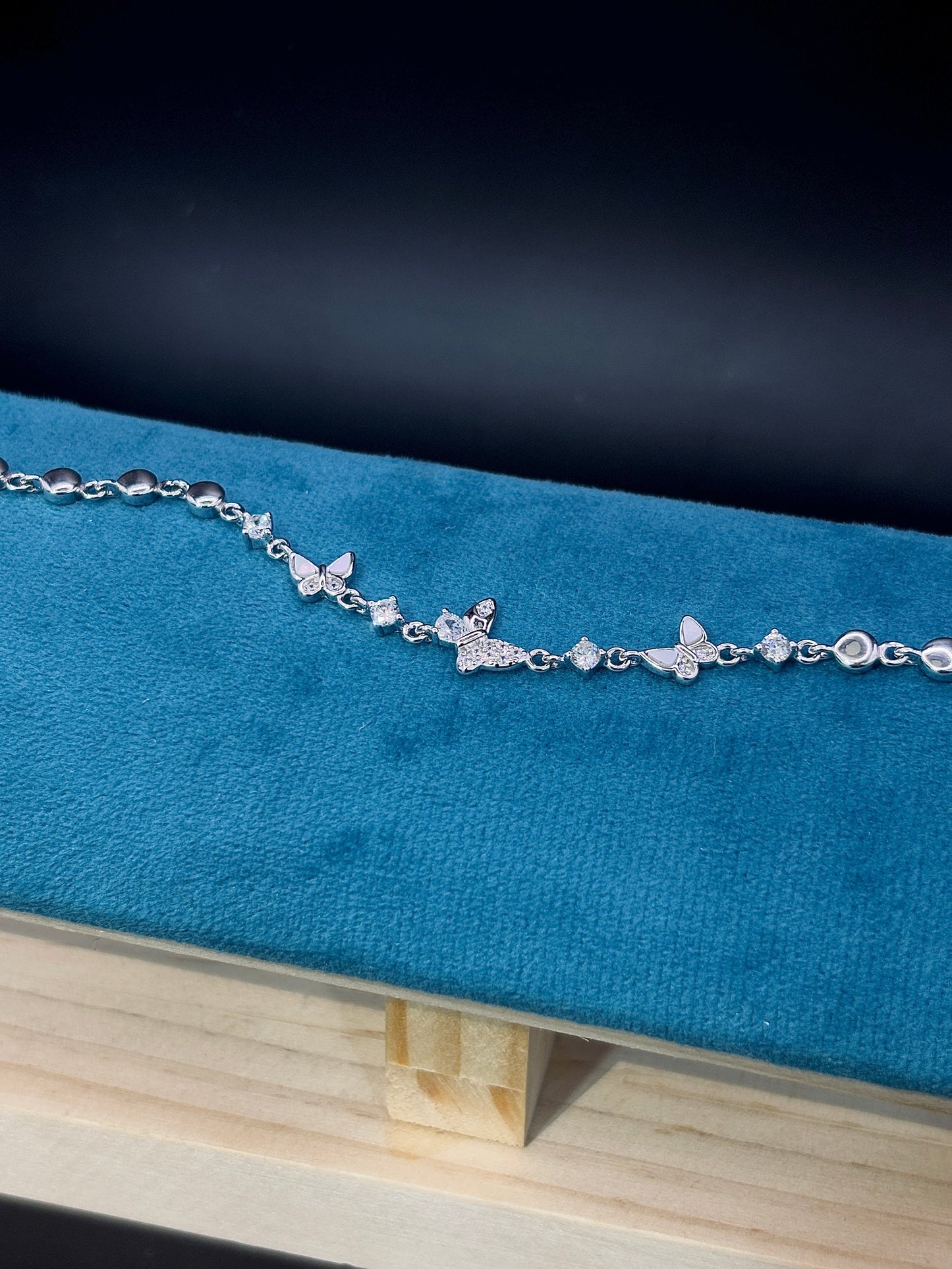 Sterling Silver Charm Bracelet with Disc & Butterfly Accents TISA Silver Elegance