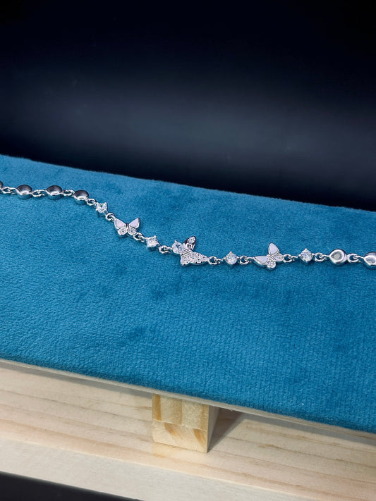 Sterling Silver Charm Bracelet with Disc & Butterfly Accents TISA Silver Elegance